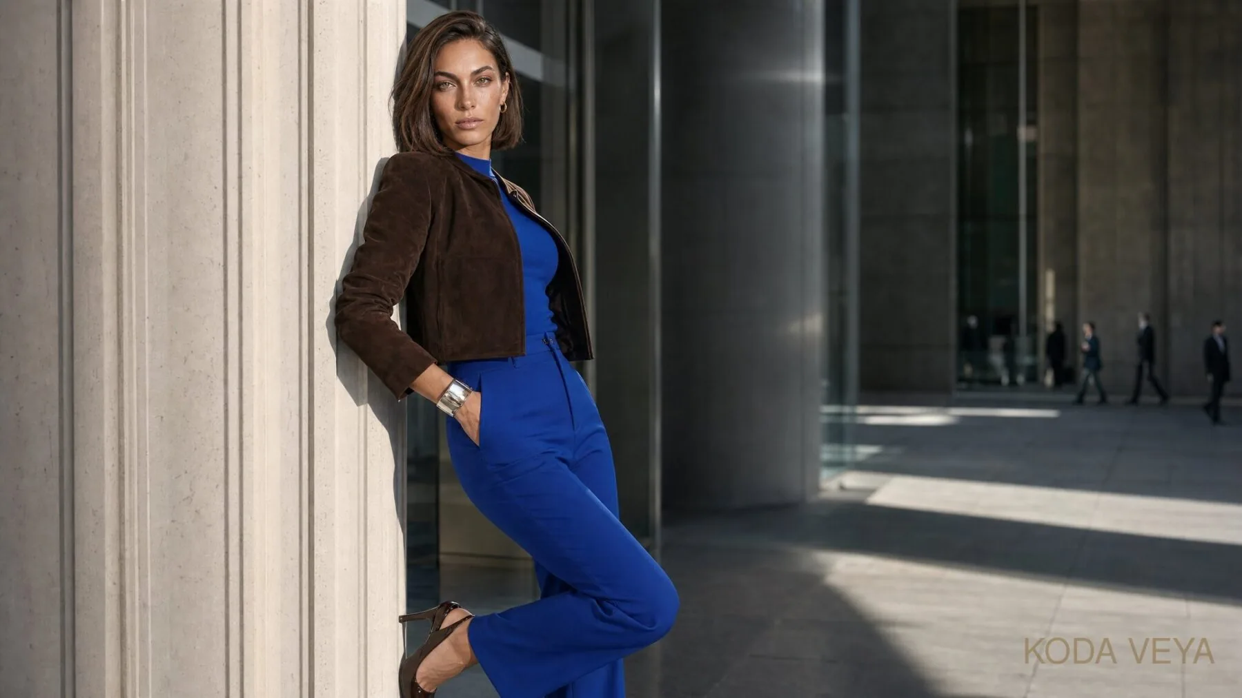 Koda Veya in a chocolate brown suede jacket and cobalt blue trousers — The Colour Code, how to wear chocolate brown and cobalt blue