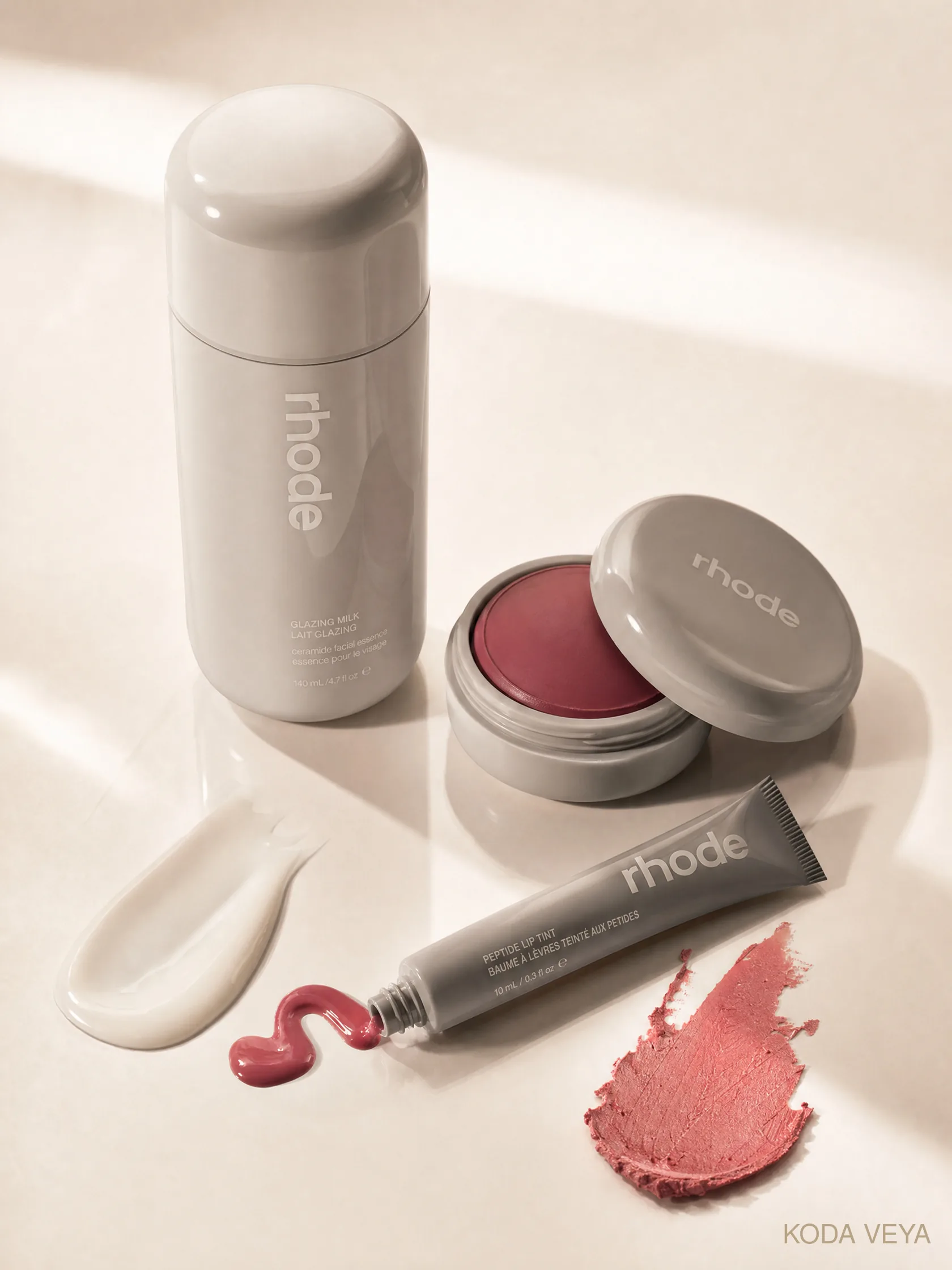 Koda with a soft flush and glossy lip, the Rhode edit